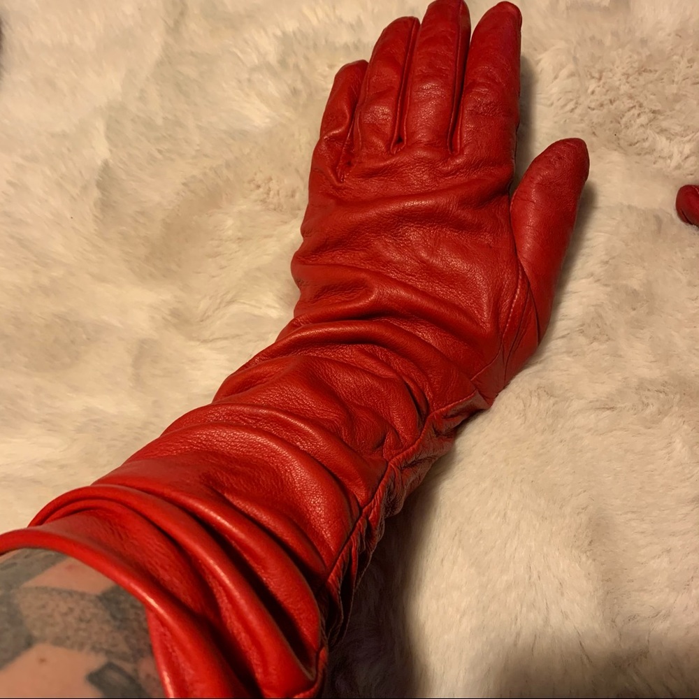 100% red leather costume gloves from Italy.